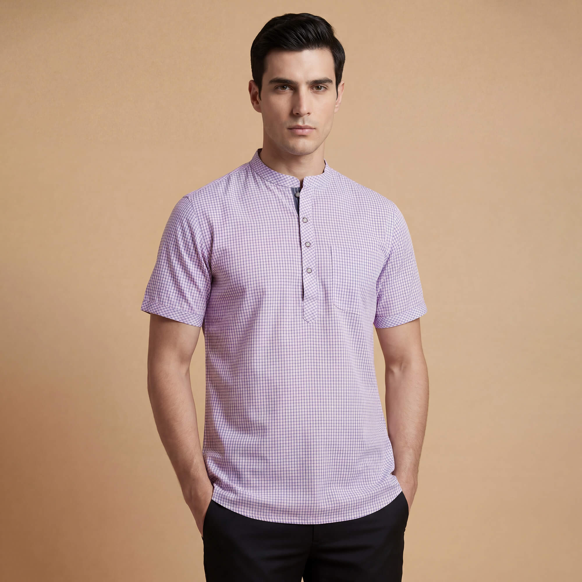 Pink cotton blend men’s short kurta with blue checks, half sleeves.